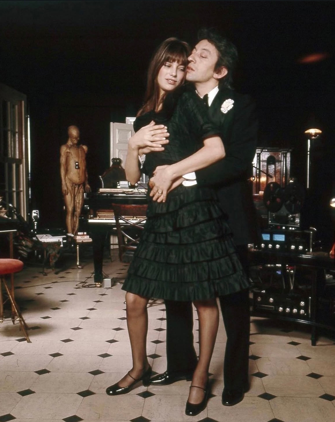 Photograph of a couple dancing, evoking the world of Serge Gainsbourg and the rue de Verneuil, inspiration for the Verneuil Case, a jewel cigarette case worn as a pendant.