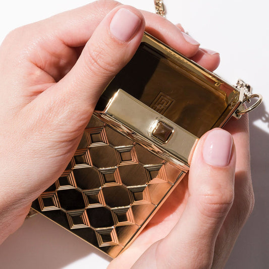 Luxury gold cigarette case pendant inspired by vintage French design.